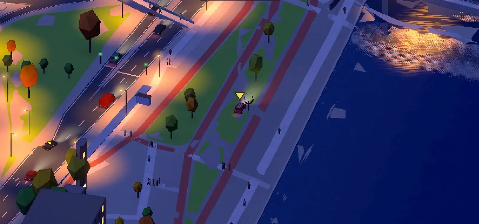 The riverside road at night with traffic and street lamps